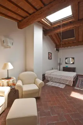 Letto o letti in una camera di Appartamenti Ruggini