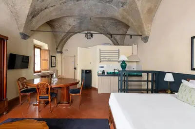 Letto o letti in una camera di Numa Florence Palazzo Belfiore