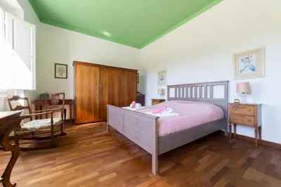 Letto o letti in una camera di Lungarno attic with private terrace and lift