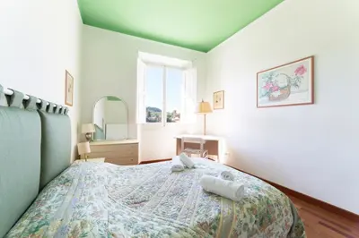 Letto o letti in una camera di Lungarno attic with private terrace and lift
