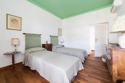 Letto o letti in una camera di Lungarno attic with private terrace and lift