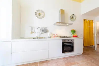 Cucina o angolo cottura di Lungarno attic with private terrace and lift