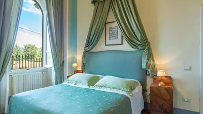 Letto o letti in una camera di VILLA LEONARDO 30&6 Emma Villas