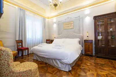 Letto o letti in una camera di Villa Tortorelli