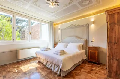 Letto o letti in una camera di Villa Tortorelli