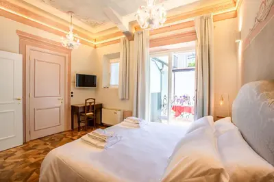 Letto o letti in una camera di Villa Tortorelli