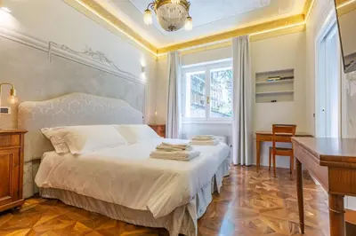 Letto o letti in una camera di Villa Tortorelli