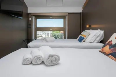 Letto o letti in una camera di Camplus Firenze Fortezza Casa Per Ferie