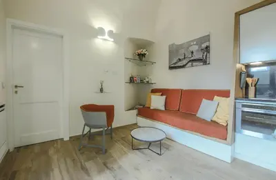 Area soggiorno di Apartments Florence - Dragomanni Apartment with Garden