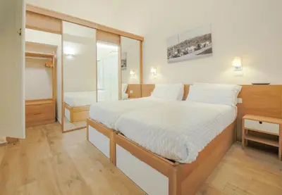 Letto o letti in una camera di Apartments Florence - Dragomanni Apartment with Garden