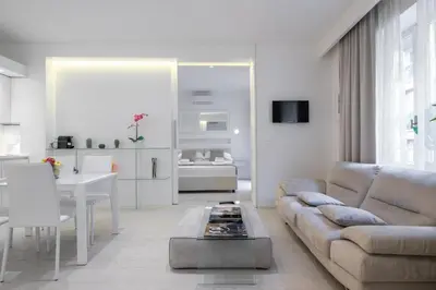Area soggiorno di Suite Jasmine by Mmega