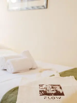 Letto o letti in una camera di Casa Anna - Charming central apartment