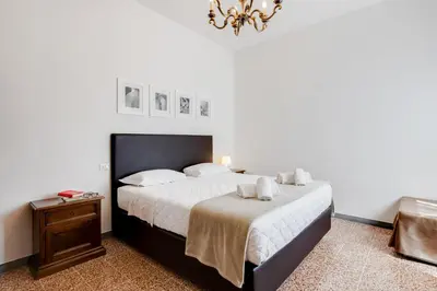 Letto o letti in una camera di GuestHost - The Country in the City - Parco delle Cascine Apartments