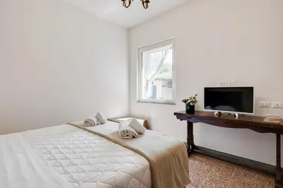 Letto o letti in una camera di GuestHost - The Country in the City - Parco delle Cascine Apartments