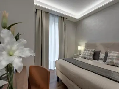 Letto o letti in una camera di Soggiorno Alessandra