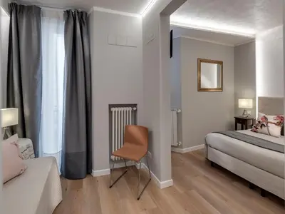 Letto o letti in una camera di Soggiorno Alessandra