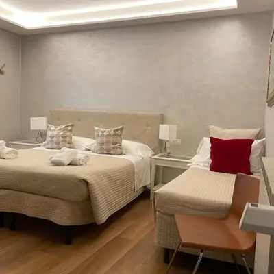 Letto o letti in una camera di Soggiorno Alessandra