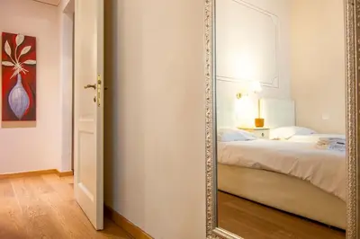 Letto o letti in una camera di Casa Michelangelo & Giotto - Tintori apt