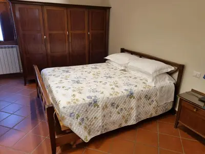 Letto o letti in una camera di Villa La Monta