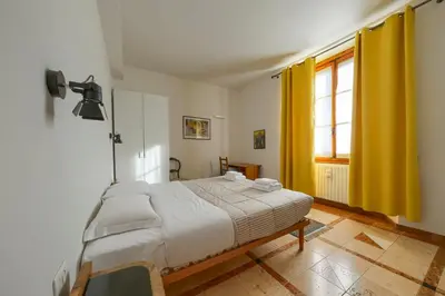 Letto o letti in una camera di Benci Lalli Apartment