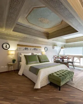Letto o letti in una camera di Apartments Florence - Piazza San Lorenzo