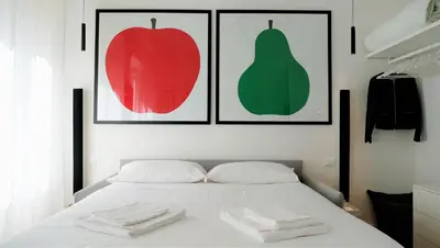Letto o letti in una camera di NOVELLA STYLE FLORENCE 2