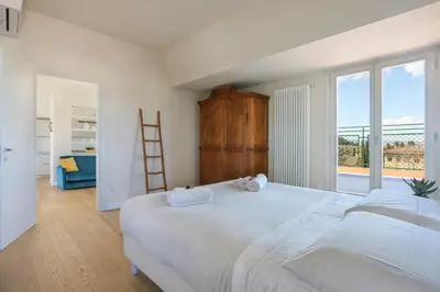 Letto o letti in una camera di Penthouse with big terrace in Oltrarno