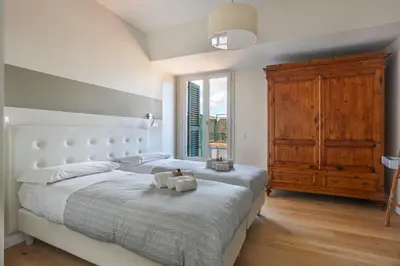 Letto o letti in una camera di Penthouse with big terrace in Oltrarno