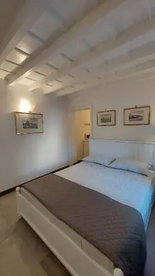 Letto o letti in una camera di Renai studio flat
