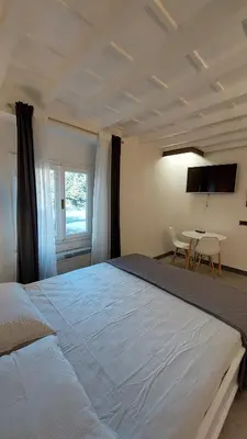 Letto o letti in una camera di Renai studio flat