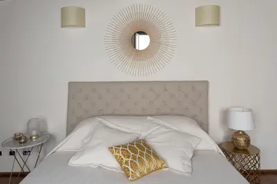 Letto o letti in una camera di Palazzo Roselli Cecconi Apartments
