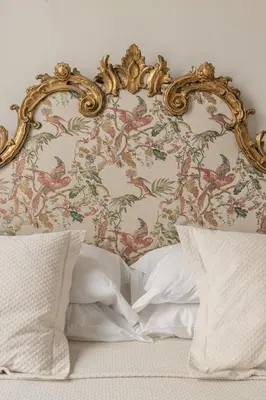 Letto o letti in una camera di Palazzo Roselli Cecconi Apartments