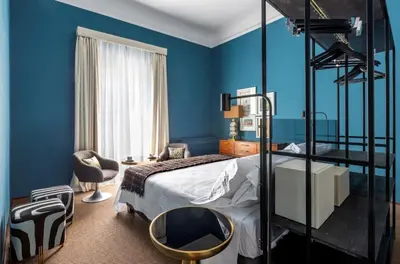 Letto o letti in una camera di 4F Boutique Hotel Florence