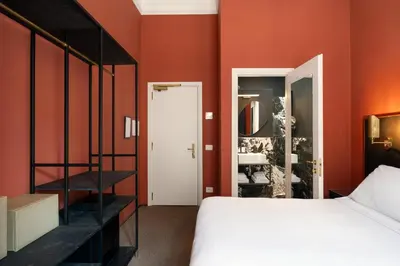 Letto o letti in una camera di 4F Boutique Hotel Florence