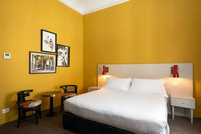 Letto o letti in una camera di 4F Boutique Hotel Florence