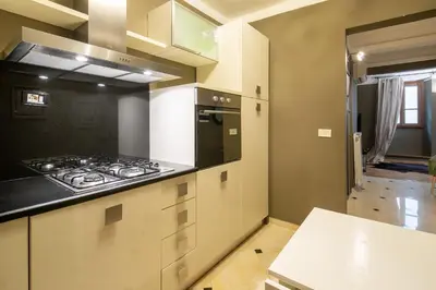 Cucina o angolo cottura di Uffizi Romantic Flat by Mmega