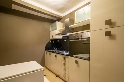Cucina o angolo cottura di Uffizi Romantic Flat by Mmega