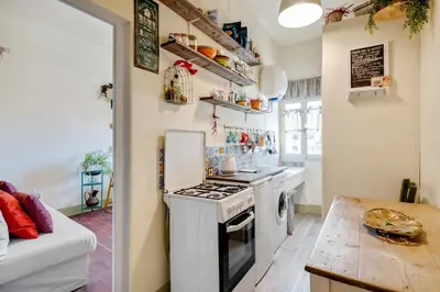 Cucina o angolo cottura di GuestHost - Il Nido dell'Artista