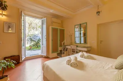 Letto o letti in una camera di Secret Garden Firenze B&B