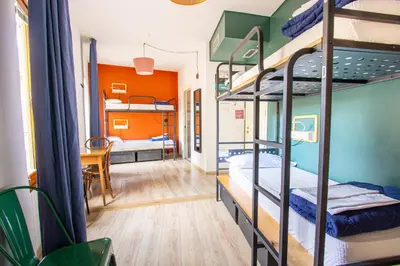 Letto o letti in una camera di Ostello Bello Firenze
