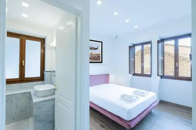 Letto o letti in una camera di Ponte Vecchio Luxury Flat