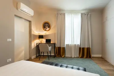 Letto o letti in una camera di San Pier Maggiore Suite