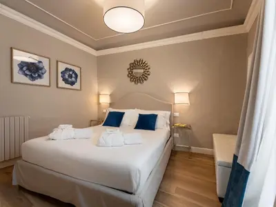 Letto o letti in una camera di San Pier Maggiore Suite