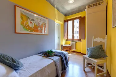 Letto o letti in una camera di Sophia Apartment by Mamo Florence