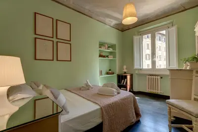 Letto o letti in una camera di Sophia Apartment by Mamo Florence