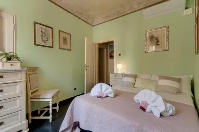 Letto o letti in una camera di Sophia Apartment by Mamo Florence