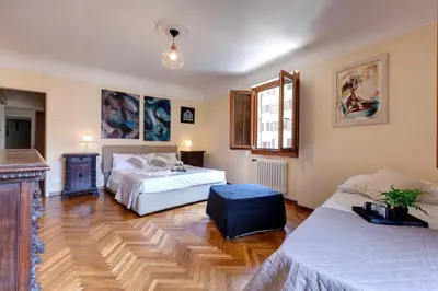 Letto o letti in una camera di Sophia Apartment by Mamo Florence