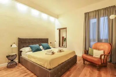 Letto o letti in una camera di Signoria Stylish Suite in Florence