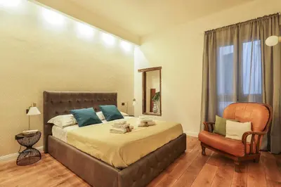 Letto o letti in una camera di Signoria Stylish Suite in Florence