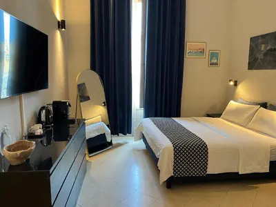 Letto o letti in una camera di Arno Boutique